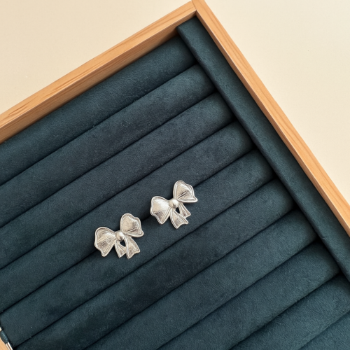 ChatGPT Image Aug 1, 2025, 12_45_08 PM Silver Belle Bow Studs